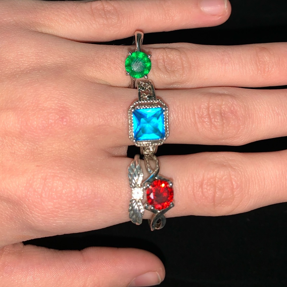 3 sterling silver rings, in red, green and blue